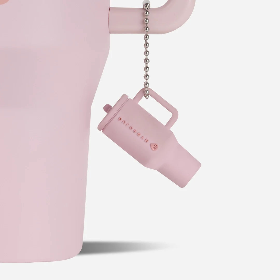traveler-keychain-t1 Web-TravelerKeychainPhotos-PinkSand2.webp